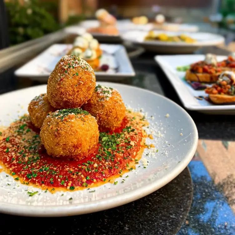 Gravy signature dishes Gravy MeatballsChicken ParmigianaRisotto Balls